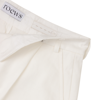 Detailed image of pants with adjustable waist in ivory